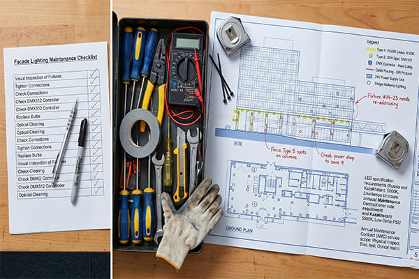 A maintenance team's checklist and tools next to a lighting plan